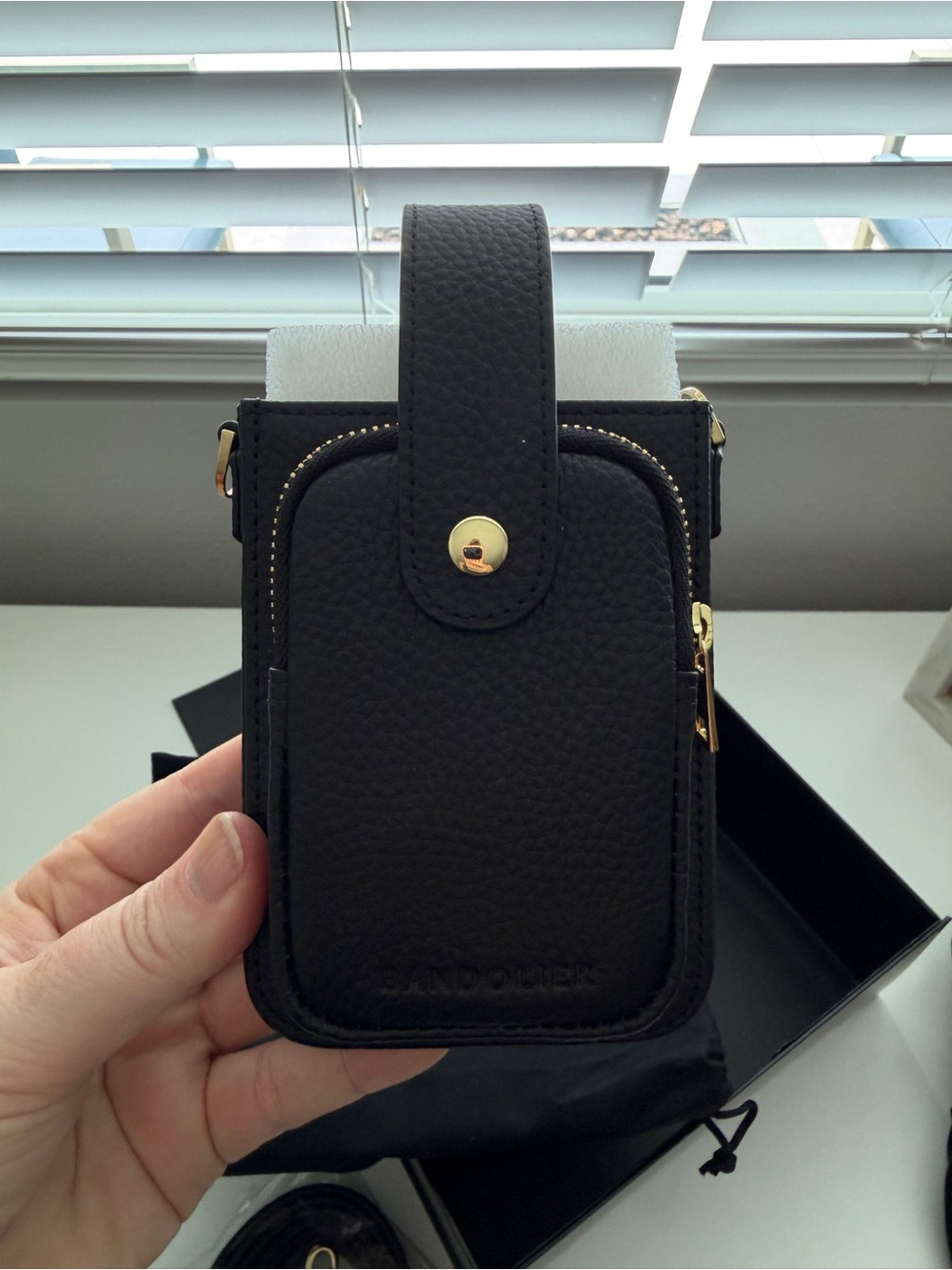 Bandolier Black Pebbled Leather Crossbody Phone Pouch with Gold Accents - Picture 3 of 9